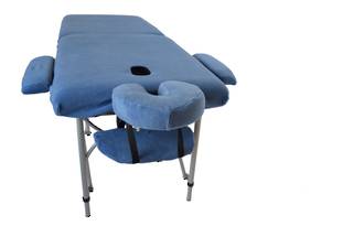 Massage Table With Set of Blue Covers
